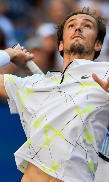 Bothered by back, Federer loses US Open QF to 'Baby Fed'